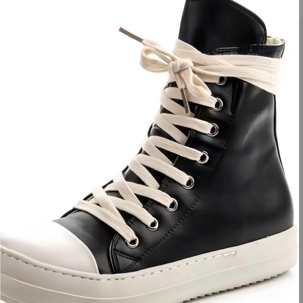 Worn once with extra pair of laces